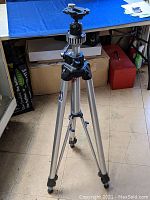 Full view of tripod extended on studio floor