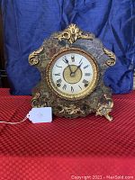 Front view of the rare Sessions Marbleite mantle clock showing full body and gold-tone decorative accents.
