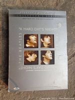 Front cover of The Beatles 'A Hard Day's Night' DVD Collector's Series with four headshots of band members on a silver background