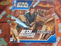 Front of the Star Wars Jedi Unleashed game box with key artwork and branding