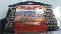Packaged 50 ft x 0.25 inch diameter camouflage poly rope with label showing brand Gorilla Pro and product details