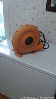 Orange Black & Decker air pump with power cord