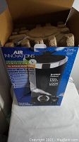 Box with Air Innovations aromatherapy humidifier branding, claims 96-hour runtime and clean mist technology