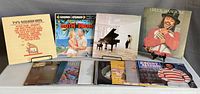Image showing all twelve vinyl record albums, including classical, musicals, and instrumentals.