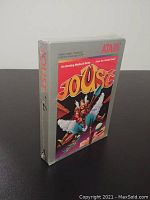 Front angled view of factory sealed Joust Atari 2600 cartridge showcasing intact shrink wrap and cover art.