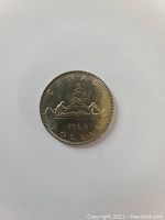 Reverse side showing the two canoes and 1968 date