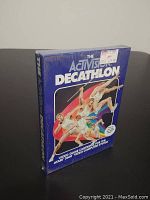 Front view of sealed Activision Decathlon Atari 2600 cartridge box showing artwork and retail price stickers.