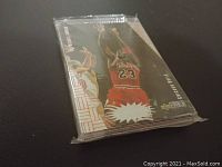 Sealed pack of 1991 Upper Deck NBA cards with Michael Jordan on front.