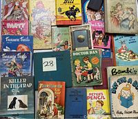 Overview photo showing multiple vintage children's books including Treasure Trails, Doctor Dan, Dumbo, Buffalo Bill and more