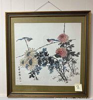 Full frontal view of framed watercolor painting showing birds on branches with flowers and artist signature.
