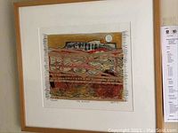 Framed monotype wall art titled "TAOS BLANKET" by Leslie Bernsen shown straight on.