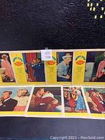 Full set of 8 lobby cards displayed showing front designs with yellow border and colorful character scenes