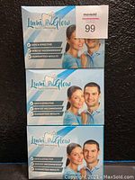 Three sealed boxes of Lumi Glow Teeth Whitening standing stacked.