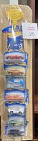 Front view of sealed Hot Wheels strip showing all five original cars in packaging with Hot Wheels logo hanger