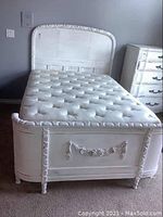Overall assembled double bed with headboard, footboard, mattress in room