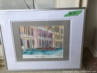 Framed watercolor print of Venice canal with boats and villas, signed by artist Susan Fazzari with title visible