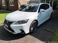 Front three-quarter view showing driver side and front grille