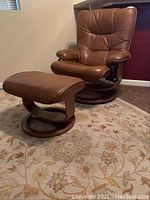 Full view of recliner with ottoman on area rug