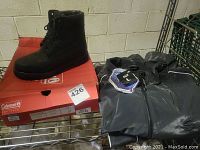 Coleman boots and South Pole vinyl suit together showing both items in lot