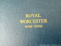 Top close-up of the blue presentation box with gold Royal Worcester Bone China text
