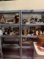 Shelves filled with assorted Christmas decorations and Harley Davidson collectibles, including figurines, art pieces, and rugs.