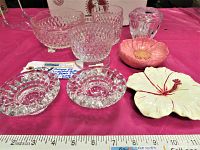 Photo showing full set including glass candlestick holders, chalkware flower dishes, footed bowl, toothpick holder and candleholder.