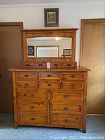 Full frontal view of pine dresser with attached mirror on top