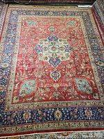 Full view of rug showing overall pattern and border