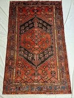 Full front view of rug laid flat on white drop cloth