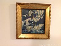 Framed oil painting of a galleon ship on a dark sea with white flowing sails and a masked rower.