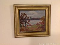Framed oil painting mounted on wall showing the full artwork and frame.