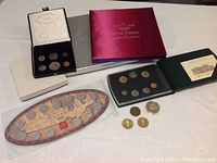 Overview of all items including folios, coin sets and loose coins