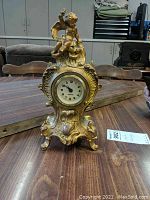 Front view of Jennings Brothers Mercedes desk clock showing digital clock insert.