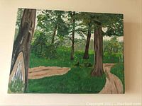 Photo showing the full oil painting of a green forest with trees and a dirt path.