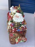 Top/side view of Santa’s Sleigh showing Santa on sleigh filled with gifts