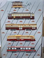 Framed print featuring vintage Toronto streetcars in rows with a grey background and Toronto Transit Commission insignia