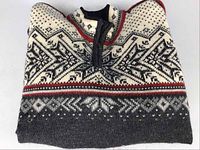 Folded front view showing overall Fair Isle pattern and color palette