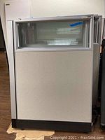 Front view of the cubicle panel showing fabric and window insert