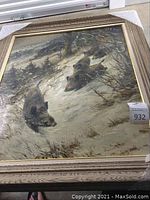 Full view of the framed oil painting showing three wild pigs in a snowy forest scene