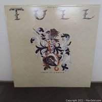 Front cover of Jethro Tull Crest of a Knave vinyl album with band name and crest artwork
