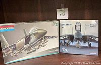 Photo showing the Monogram F-14A/B Tomcat model kit box and Lock On No.18 magazine side by side.