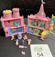 Two images showing 1995 Polly Pocket pink castle set with figures and accessories arranged in front.