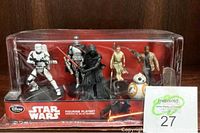 Front view of Star Wars figurine playset inside clear plastic packaging showing all six figurines.