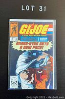 Single photo of G.I. Joe comic book issue #94 with cover showing Snake-Eyes with a bandaged face and title text. Comic is bagged and boarded.