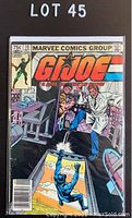 Photo of the front cover of G.I. Joe: A Real American Hero #15 comic book, showing Marvel Comics branding and colorful cover art.