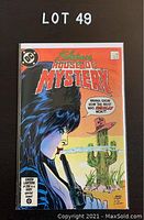 Comic book Elvira's House of Mystery #3 with colorful cover art featuring Elvira and a desert scene.