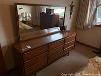 Front view of full dresser with mirror attached showing overall design and finish
