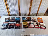 Photo showing all 14 television series DVD sets arranged on a table, including Law & Order collection, The Rockford Files, Twin Peaks, Northern Exposure, and Monk.
