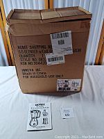 Box labeled with Ultrex Kitchen Preparation Center details. Showing model and power specifications.