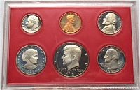 Six-coin obverse in red tray